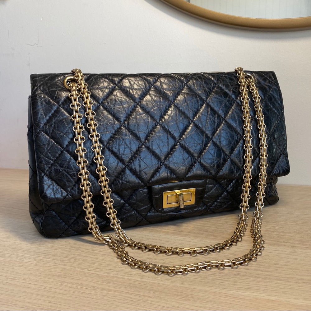 CHANEL 2.55 quilted black/gold double flap bag